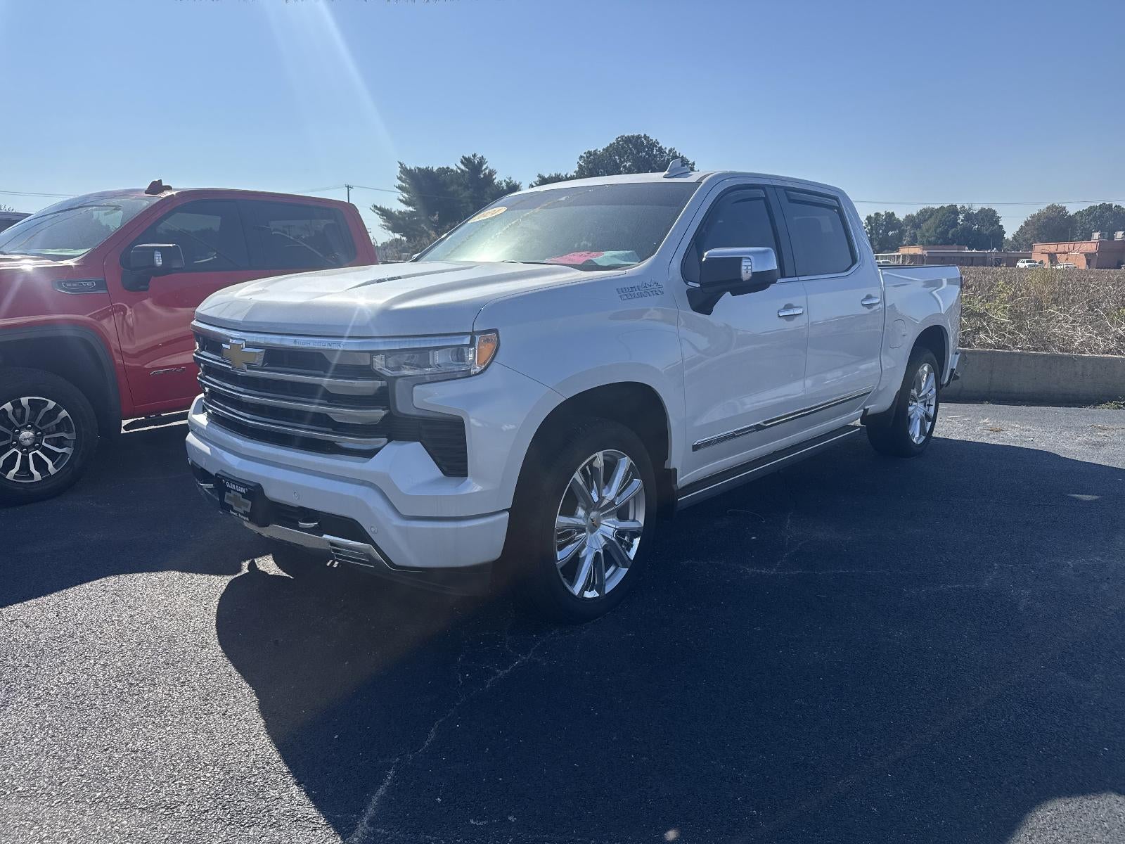 2024 Chevrolet Silverado 1500 High Country in Iridescent Pearl Tricoat — front three-quarter view