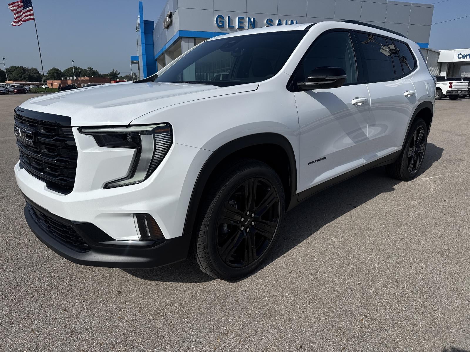 2026 GMC Acadia Elevation in Summit White — front three-quarter view