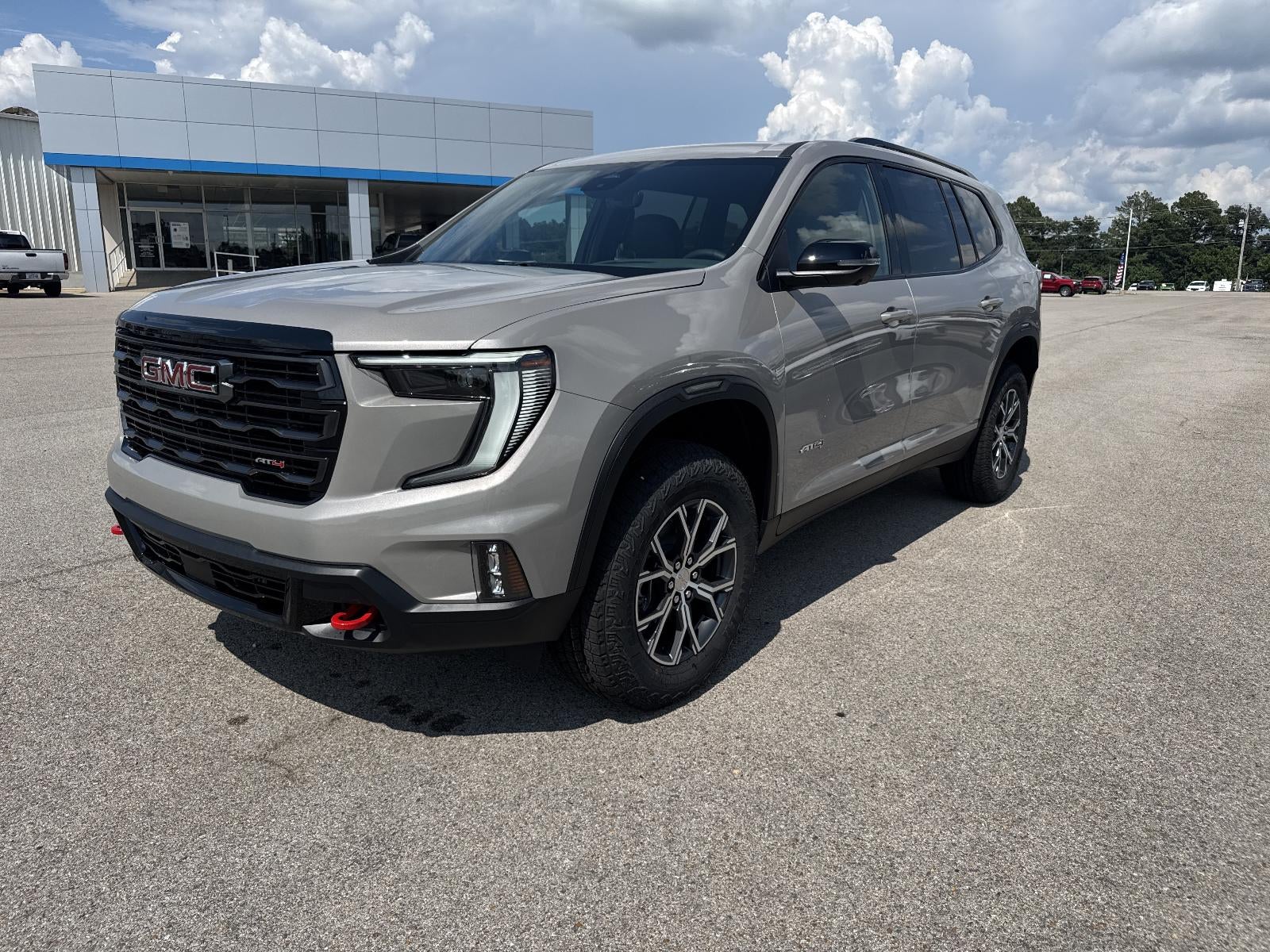 2026 GMC Acadia AT4 in Riverstone Metallic — front three-quarter view