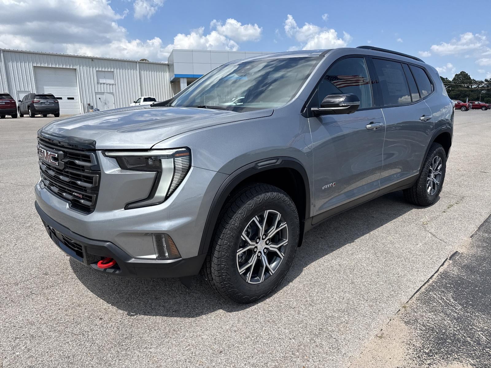 2026 GMC Acadia AT4 in Sterling Metallic — front three-quarter view