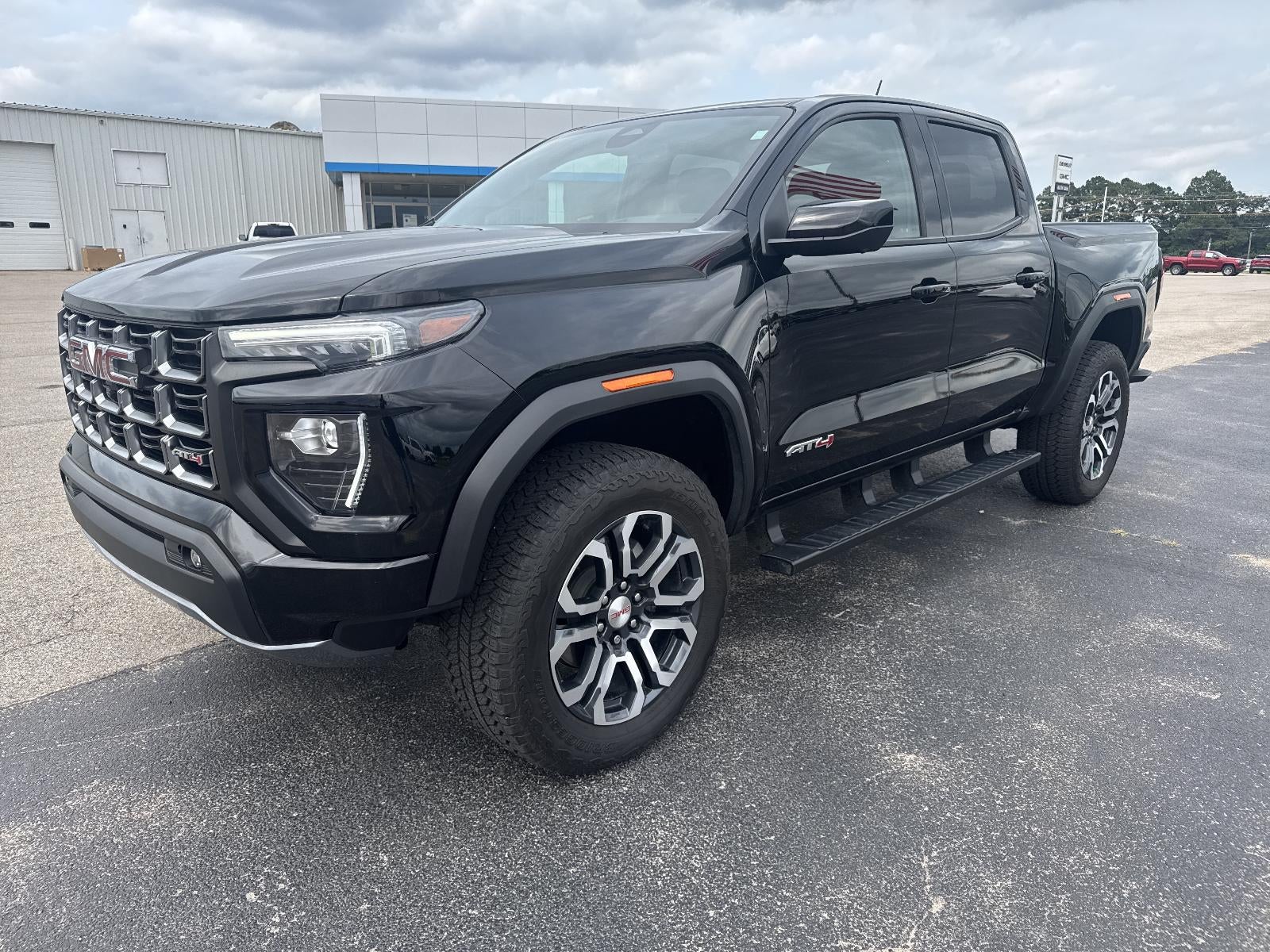 2024 GMC Canyon AT4 in Onyx Black — front three-quarter view