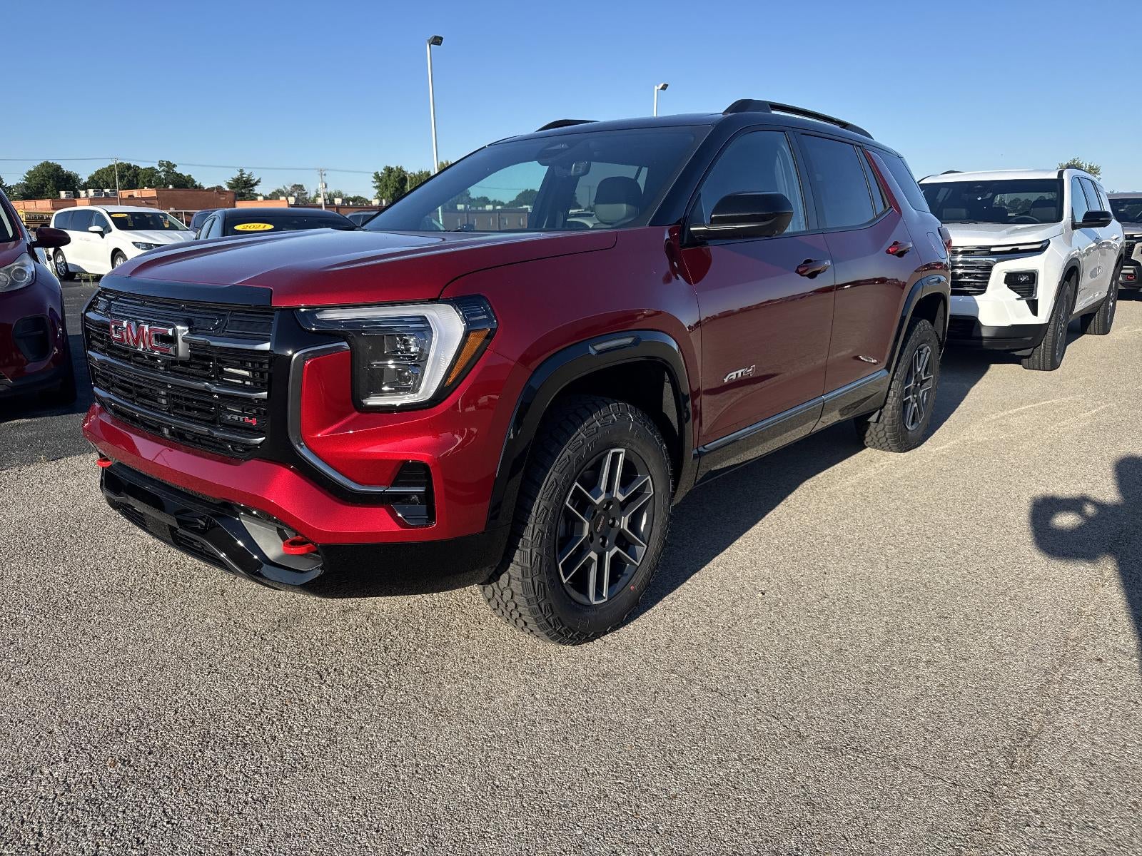 2026 GMC Terrain AT4 in Volcanic Red Tintcoat — front three-quarter view